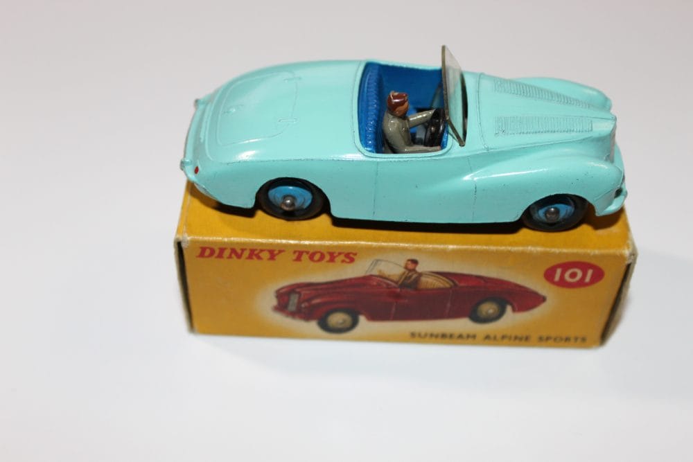 Vintage Dinky Toys Sunbeam Alpine Tourer diecast model car for collectors.