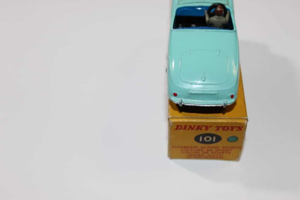 Detailed miniature model of Dinky Toys 101 Sunbeam Alpine Tourer on its original box.