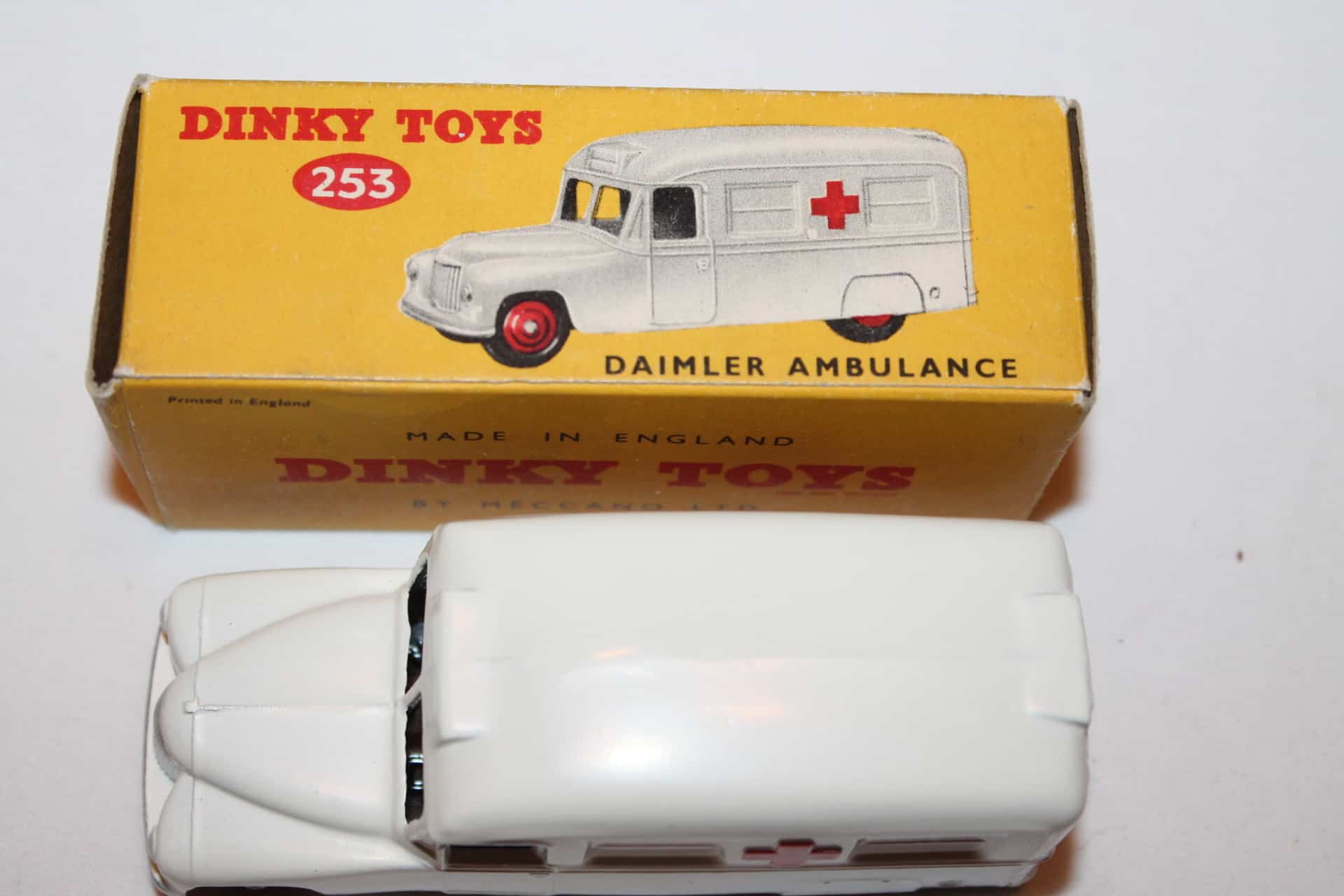 A boxed Dinky Toys No.253 Daimler Ambulance with windows, Nr M, box Ex