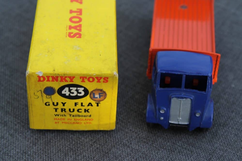 guy-tailboard-lorry-dinky-toys-513-vilolet-blue-and-orange-front