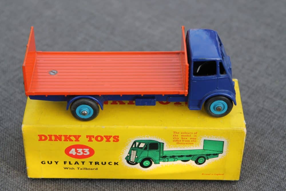 guy-tailboard-lorry-dinky-toys-513-vilolet-blue-and-orange-side