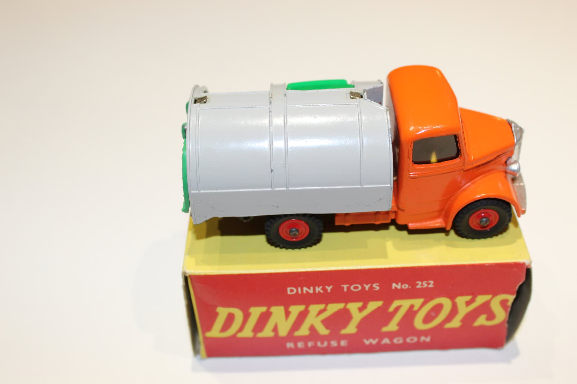 Vintage Dinky Toys refuse wagon model for collectors.