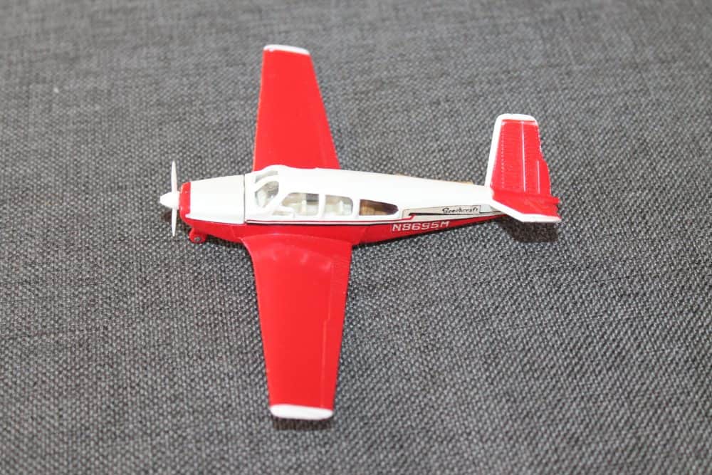 beechcraft-s35-bonanza-aircraft-red-and-white-dinky-toys-710-left-side