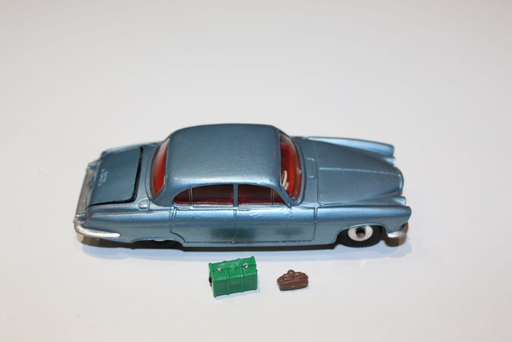 Vintage Dinky Toys 142 Jaguar Mark X model car with accessories.