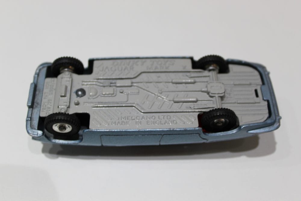 Dinky Toys 142 Jaguar Mark X diecast model underside, vintage collectible car, scale model.