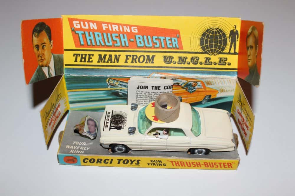 Vintage Corgi Thrushbuster toy car with packaging and accessories.