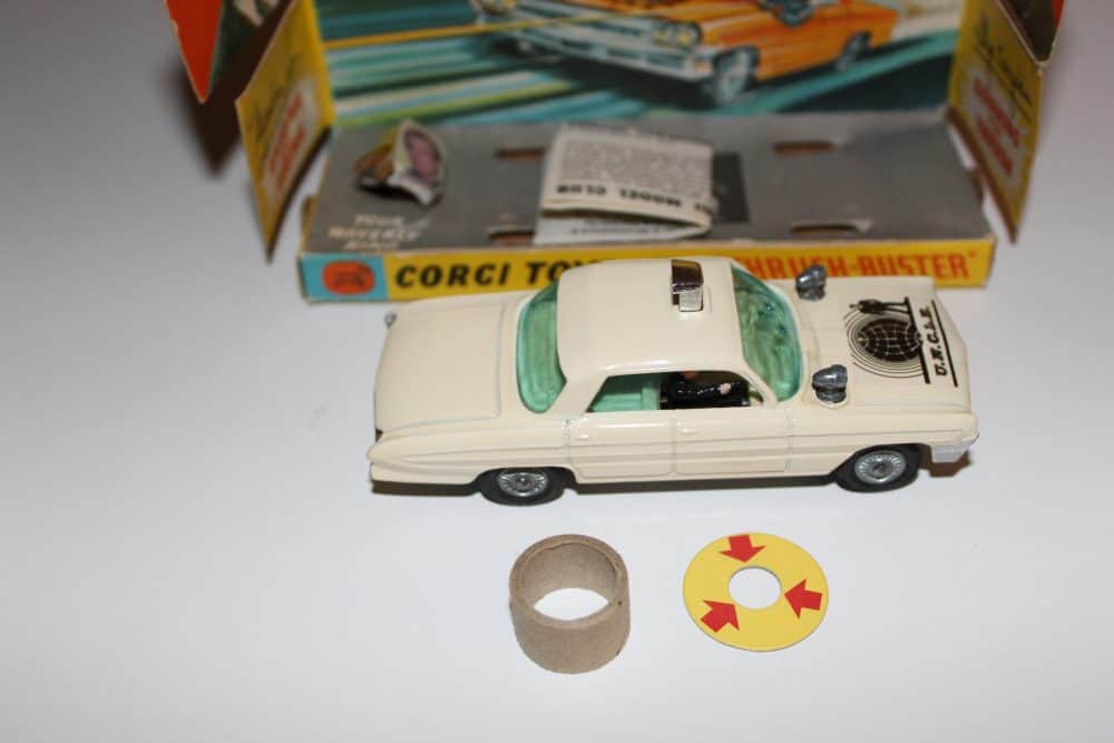 Detailed Corgi Toys 497 The Man From Uncle Thrushbuster model with packaging and accessories.