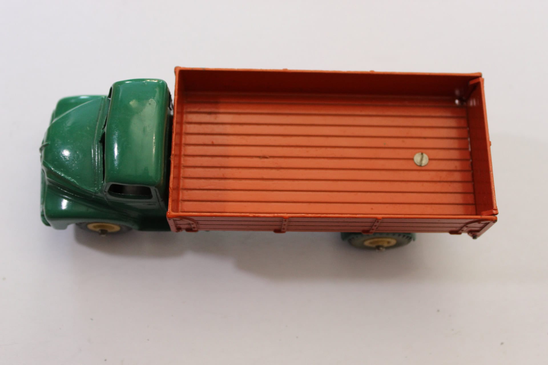Vintage Dinky Toys 532 Comet Wagon with tailboard, green cab and orange flatbed.