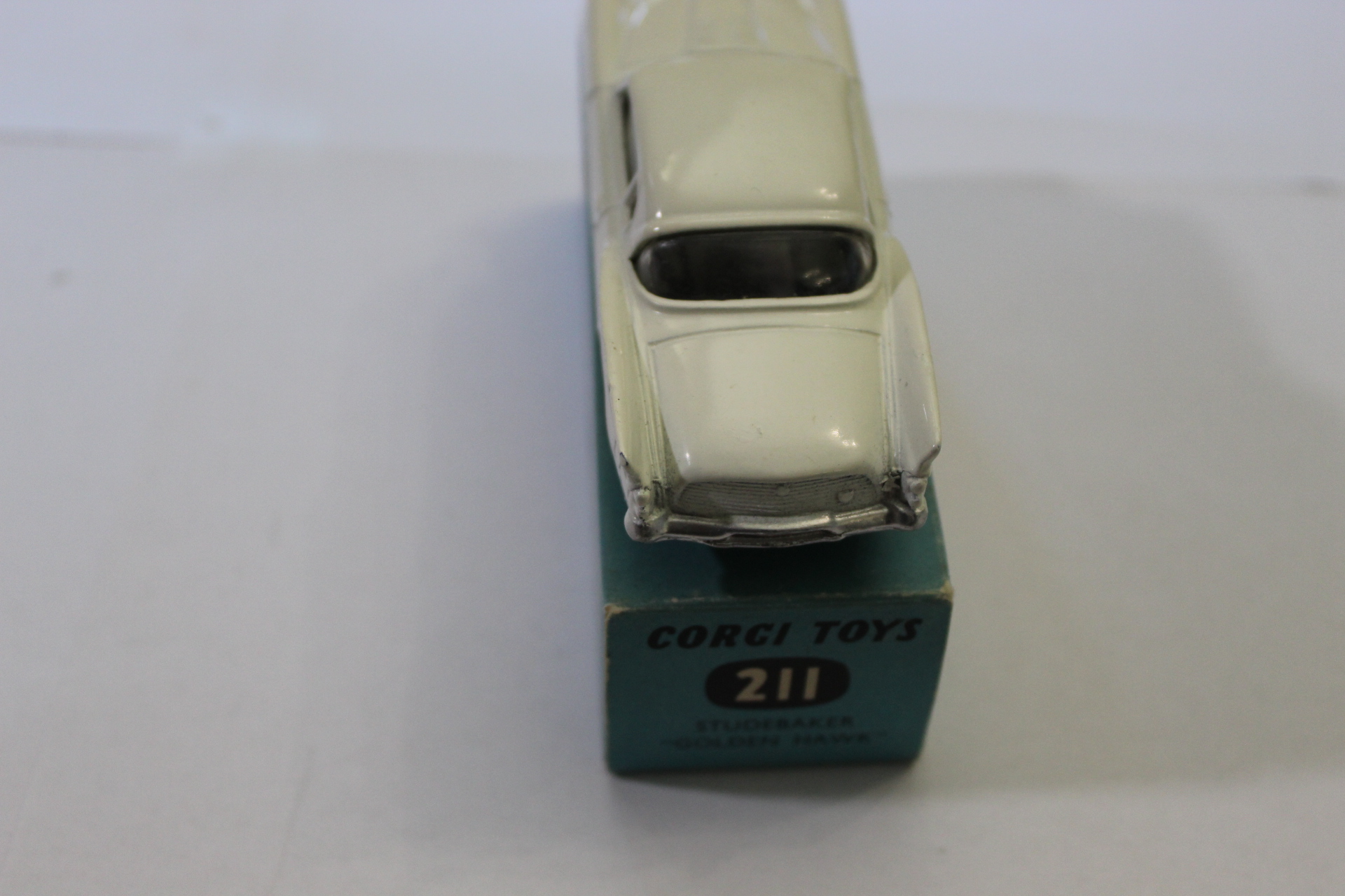 Vintage diecast car model on Corci Toys box, collectible toy car.
