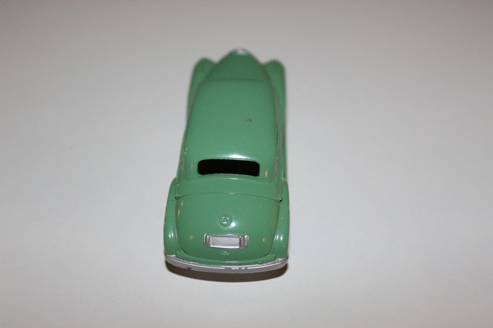 Detailed green Marklin Mercedes Benz Saloon 300 toy car for collectors.