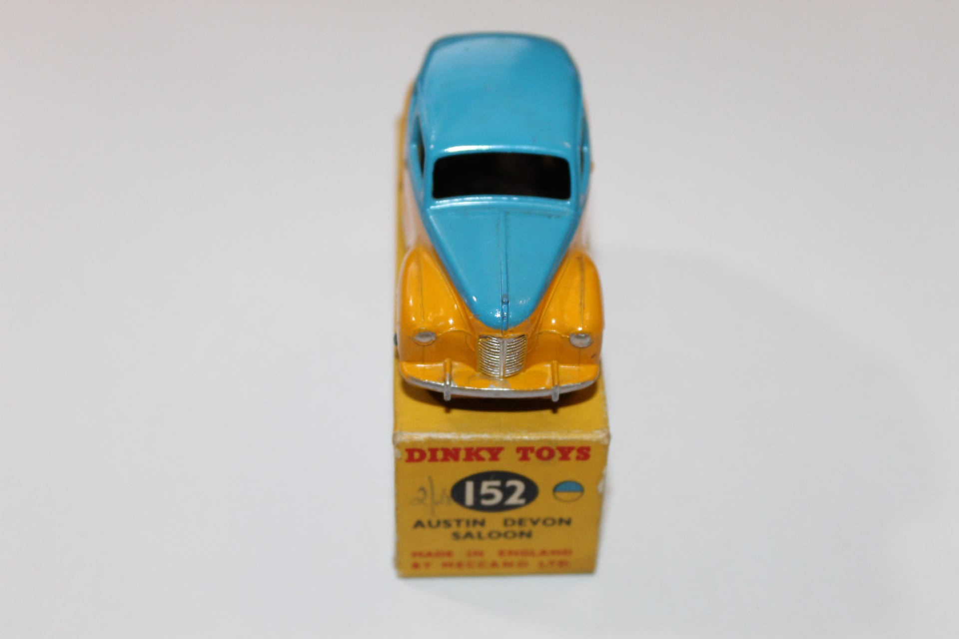 Vintage Dinky Toys 152 Austin Devon diecast model car on original box.