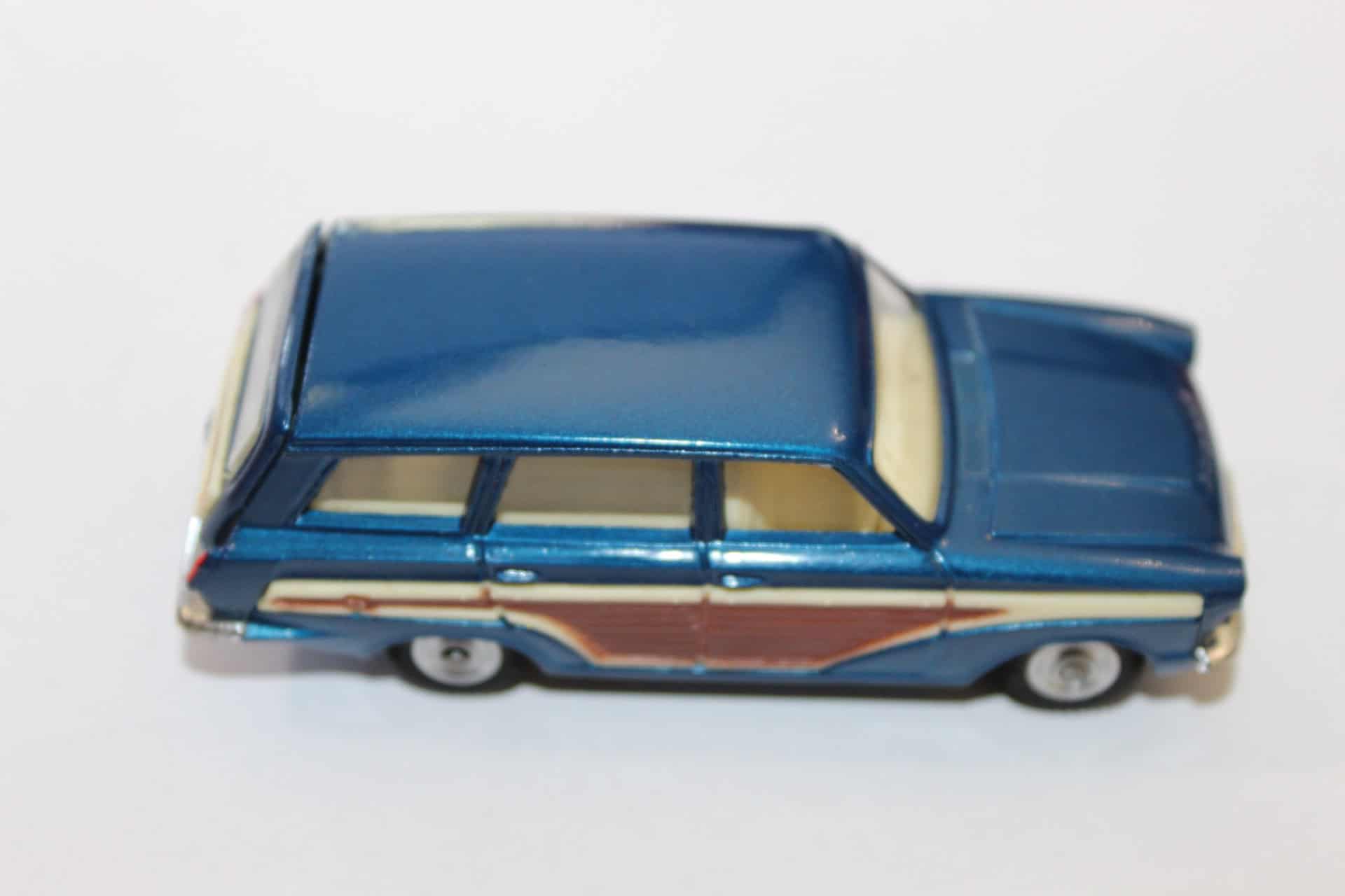 Vintage Corgi Ford Consul Cortina diecast model car, blue with wood effect detail.