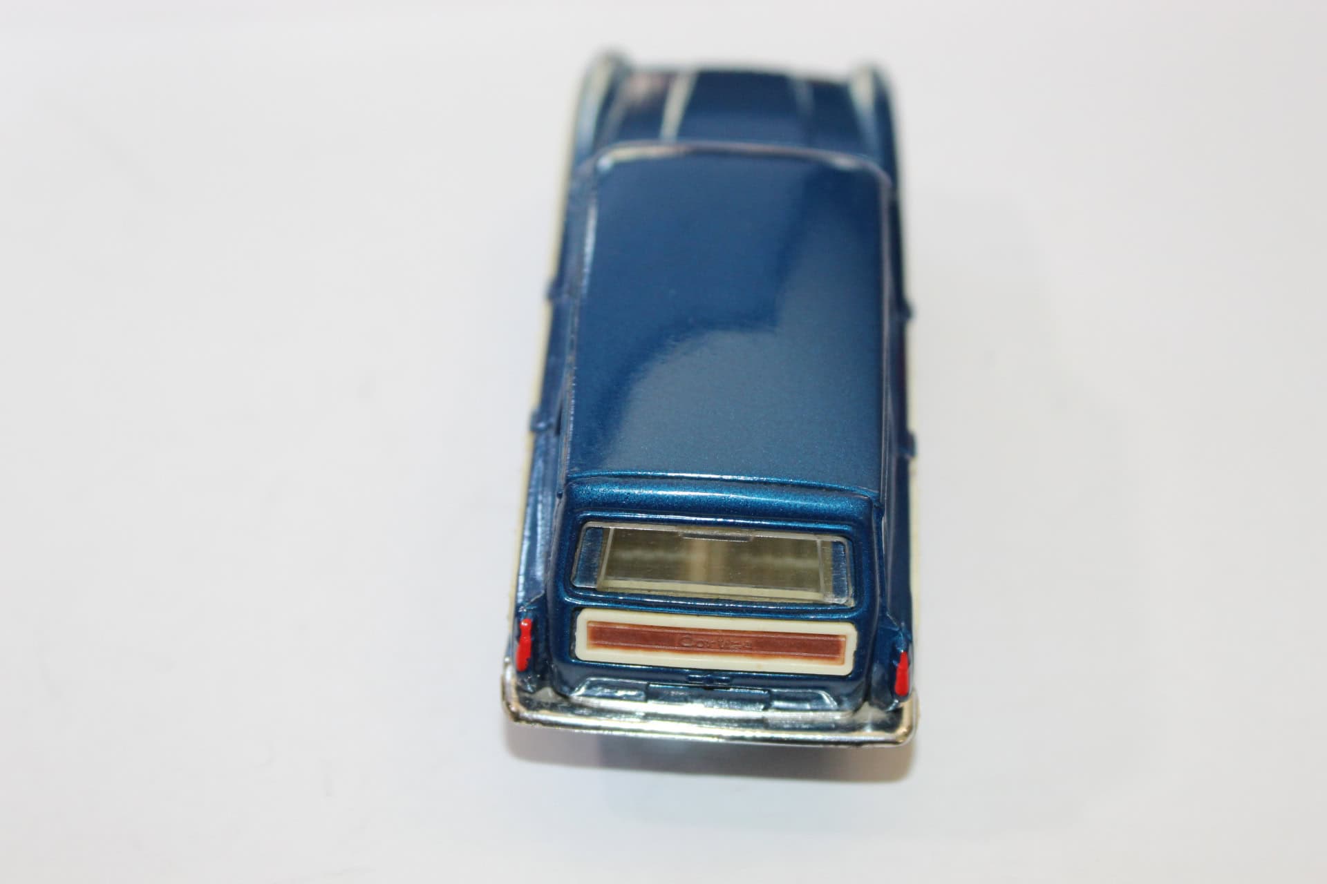Vintage Corgi Ford Consul Cortina diecast model for golf set collection.