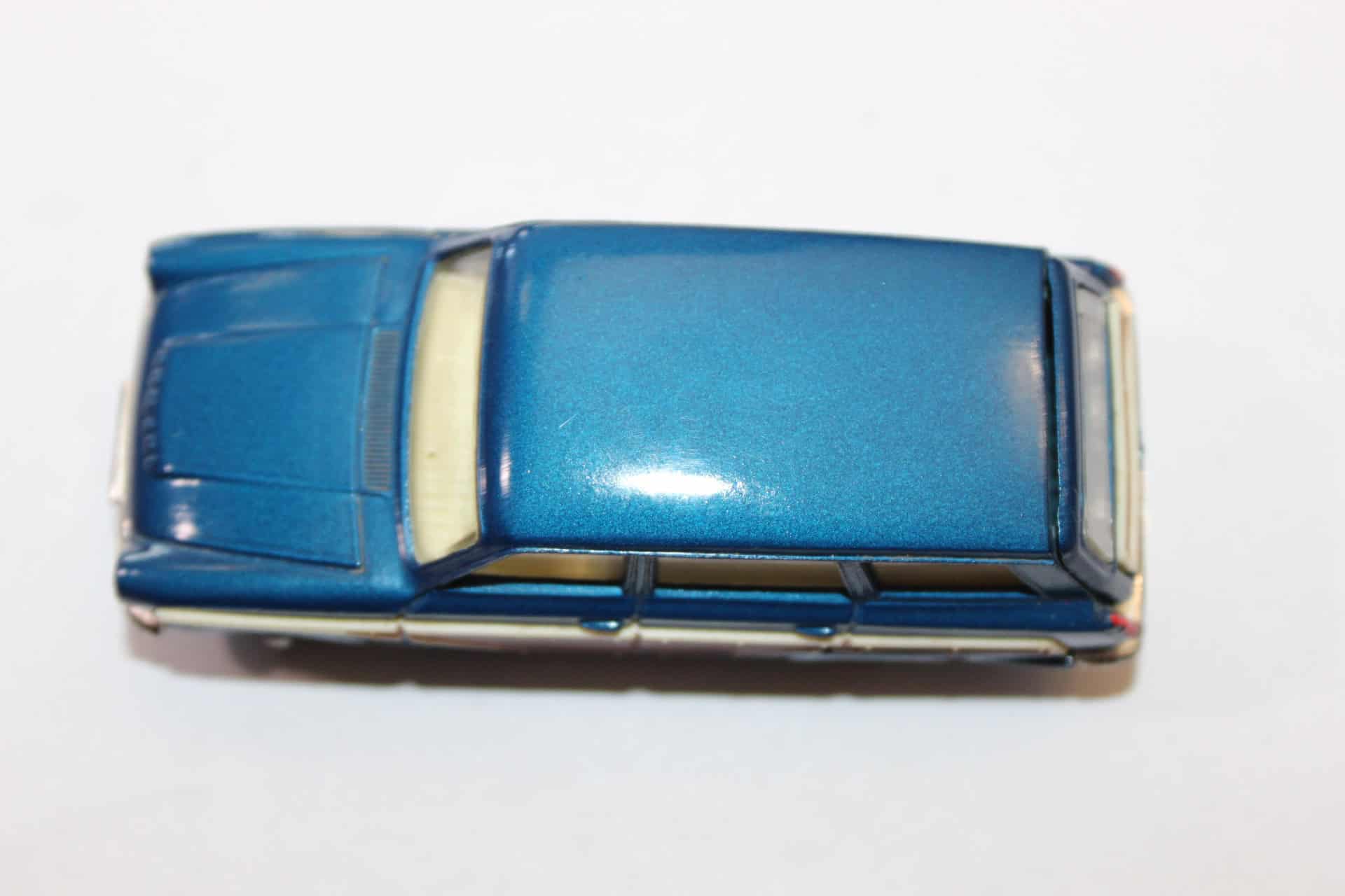 Vintage blue Corgi Toys 440 Ford Consul Cortina model car for golf set collection.