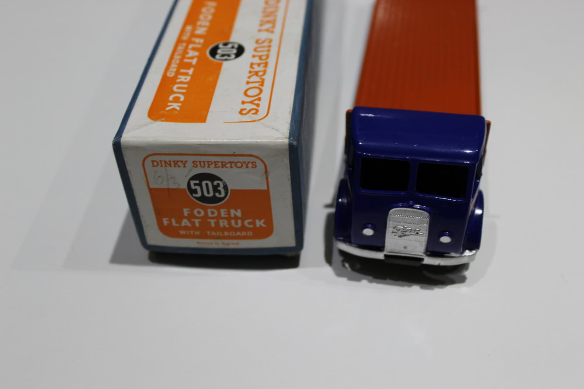Vintage Dinky Toys 503 Foden flat truck model with tailboard and packaging.