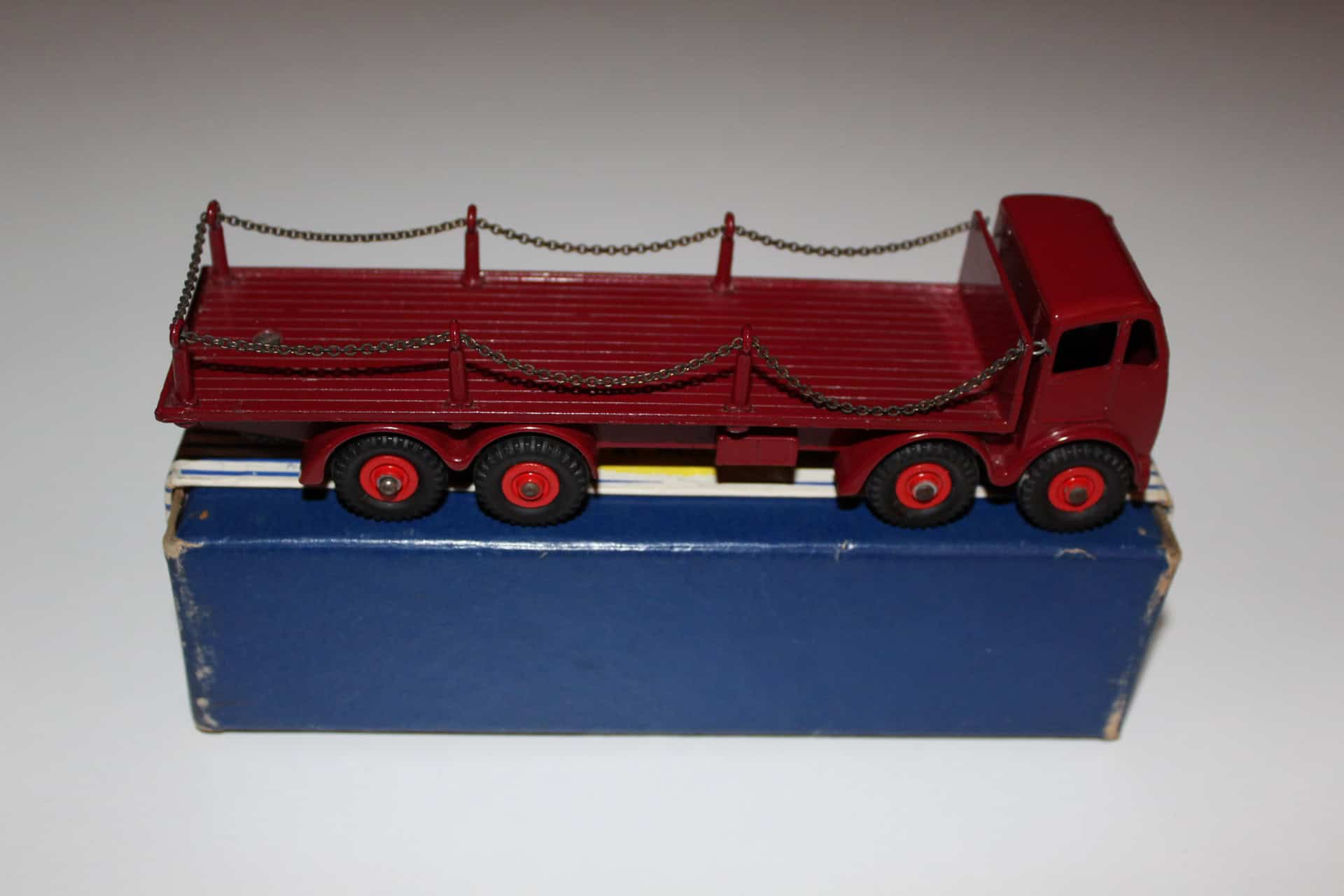 Vintage Dinky Toys 905 Foden chain lorry with red cab and chain bed, collectible model.