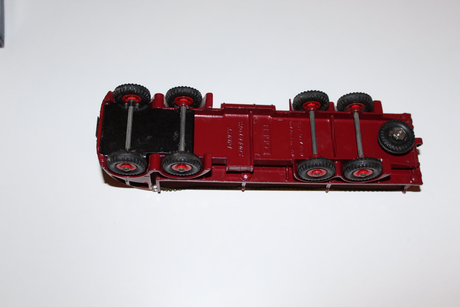 Red diecast Foden 2nd cab chain lorry model with detailed wheels.