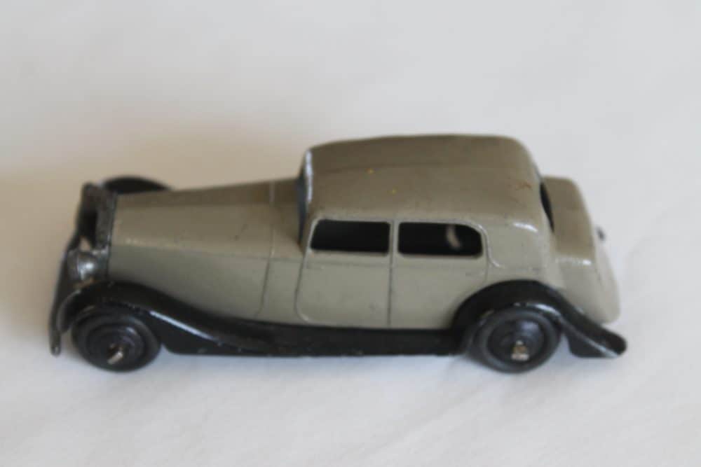 Dinky Toys 030C Daimler diecast model car, vintage collectible toy, black and grey.