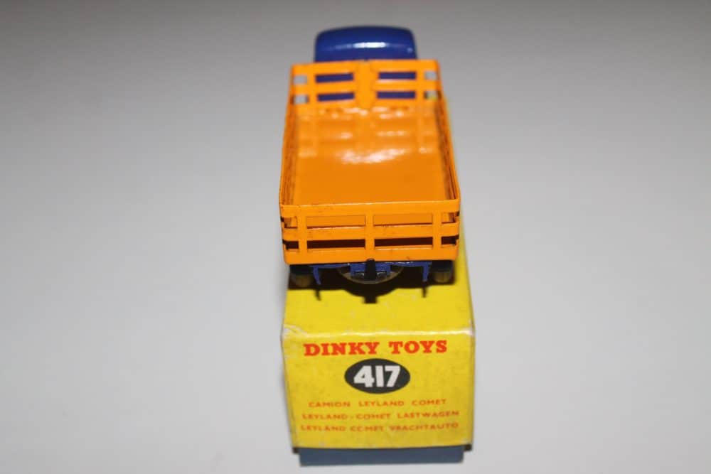 Dinky Toys 417 Leyland Comet Wagon model in bright orange and yellow, vintage diecast toy vehicle.