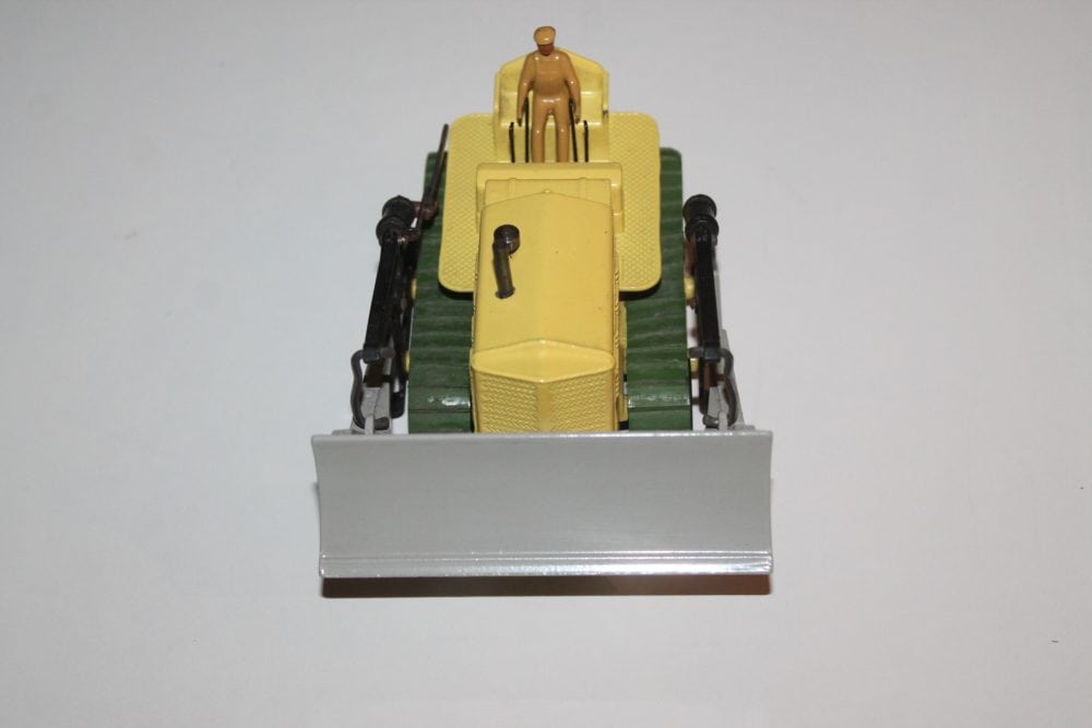 Detailed Dinky Toys 530 Citroen DS19 diecast car with yellow and green finish.