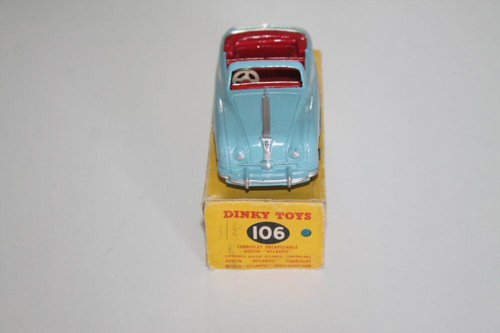 Vintage Dinky Toys 106 Austin Atlantic Convertible diecast model car, blue with red interior, on ori.