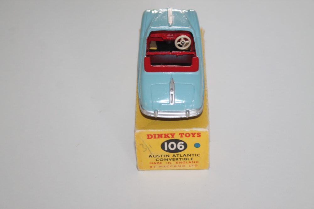 Vintage Dinky Toys 106 Austin Atlantic Convertible diecast model car, blue with red interior, on ori.