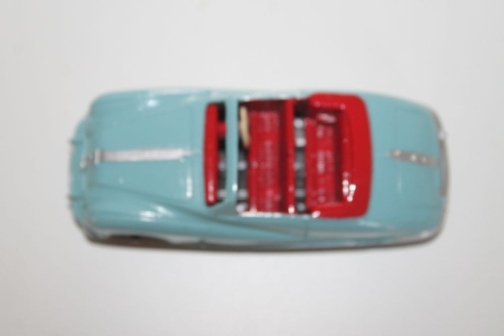 Dinky Toys 106 Austin Atlantic Convertible diecast model in light blue with red interior.