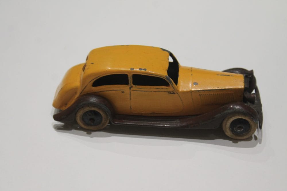 Dinky Toys 030b vintage Rolls Royce Pre-War diecast model in yellow and black.
