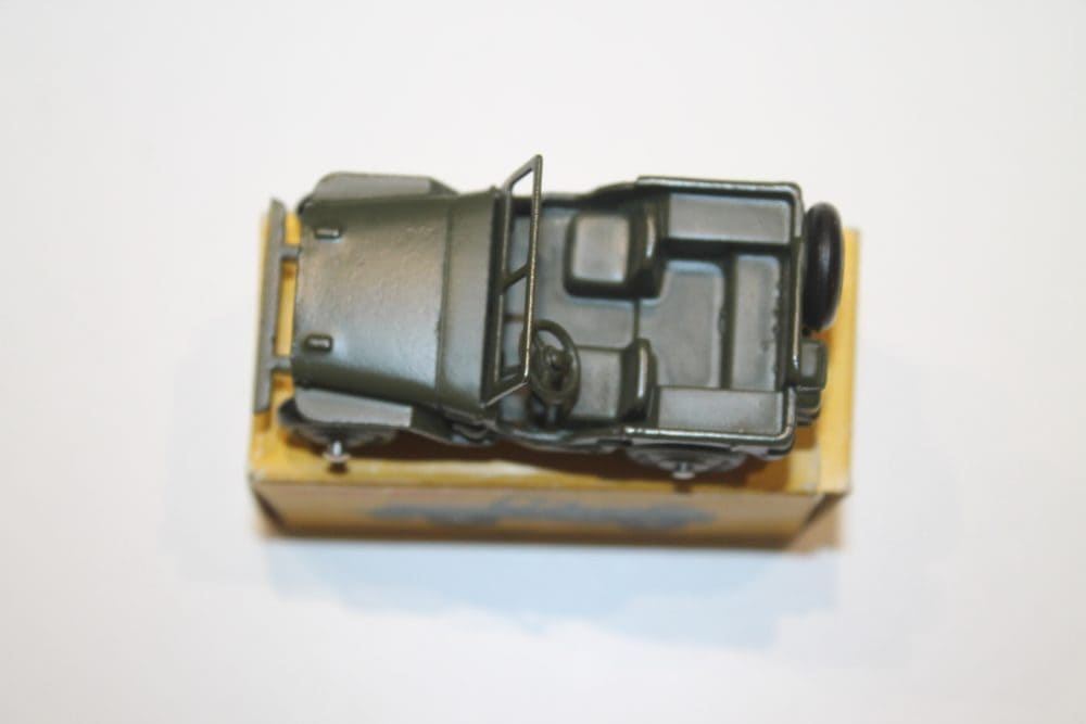 Detailed diecast model of Willys Hotchkiss Jeep from French Dinky Toys, vintage toy vehicle.