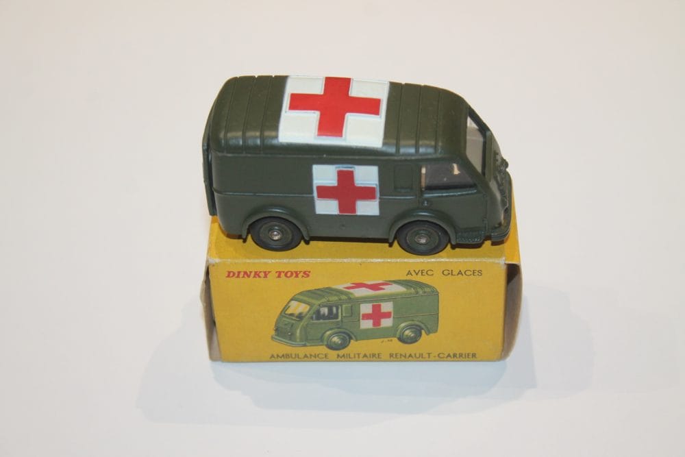 Vintage Dinky Toys French Military Ambulance model with red cross, collectible diecast vehicle.