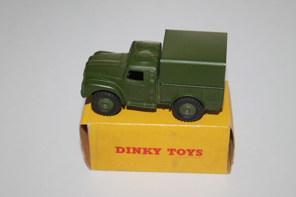 Vintage Dinky Toys 641 Army 1-Ton Cargo Truck in green on yellow box.