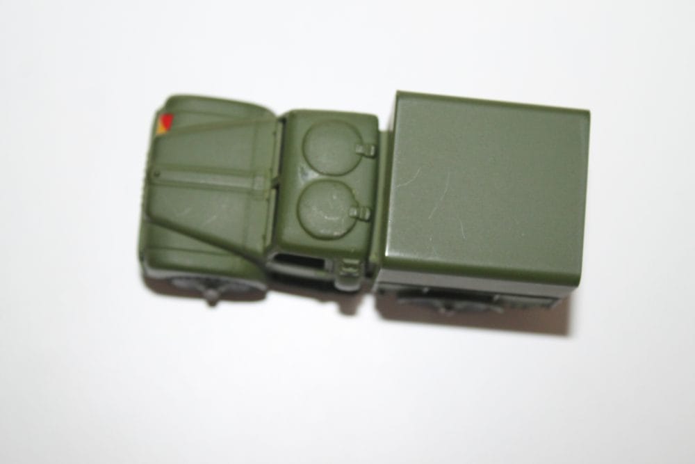 Dinky Toys 641 Army 1-Ton Cargo Truck with Windows, green diecast model for collectors.