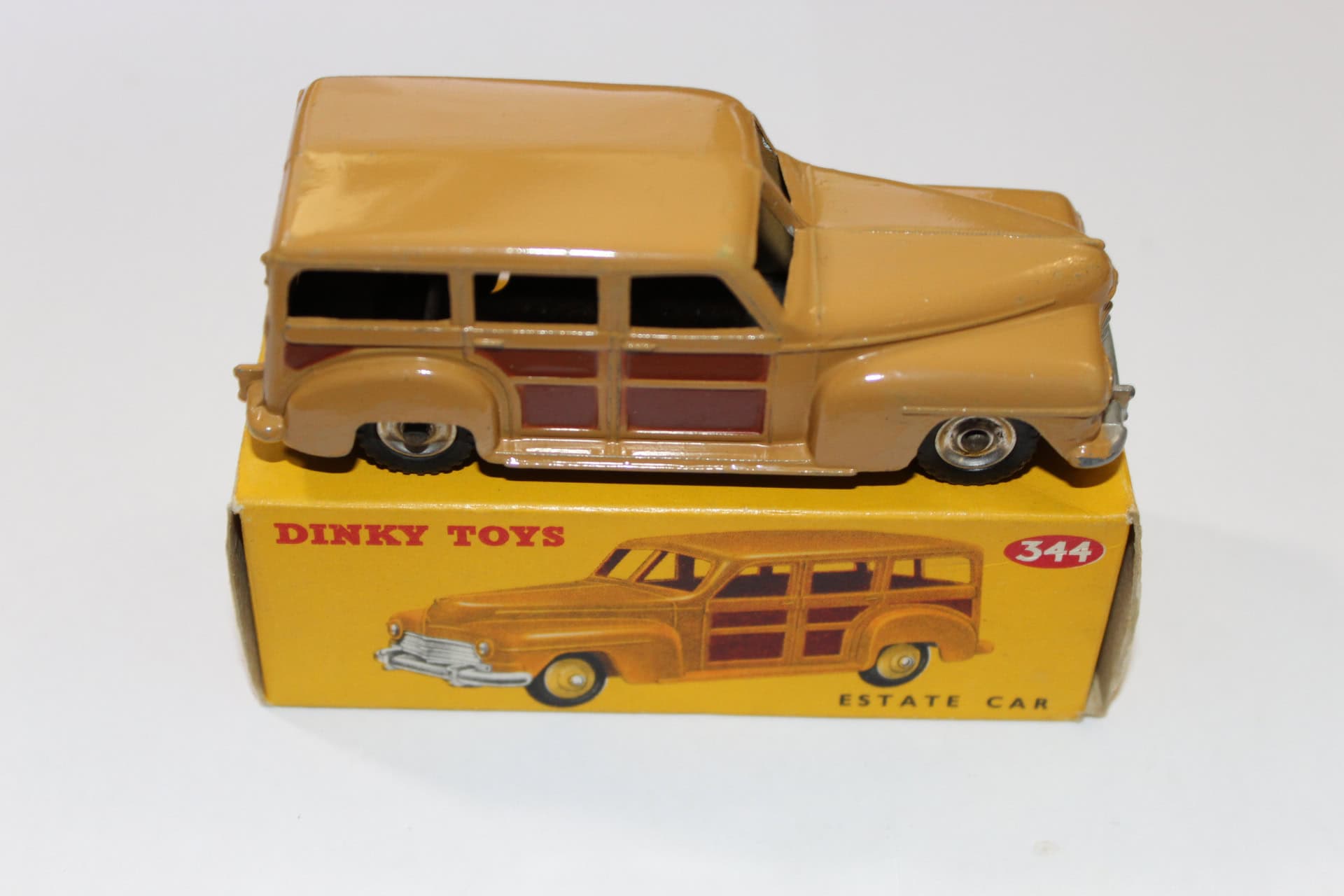 Dinky Toys 344 estate car with silver spun hubs, vintage diecast model for collectors.