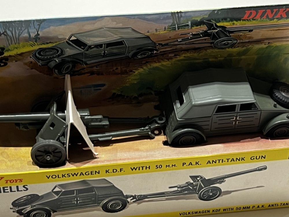 Dinky 617 Volkswagen KDF with 50mm P.A.K. anti-tank gun model toy display.