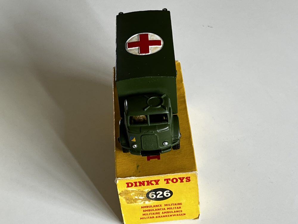 Dinky Toys 626 Army Ambulance model on display, vintage military diecast vehicle for collectors.