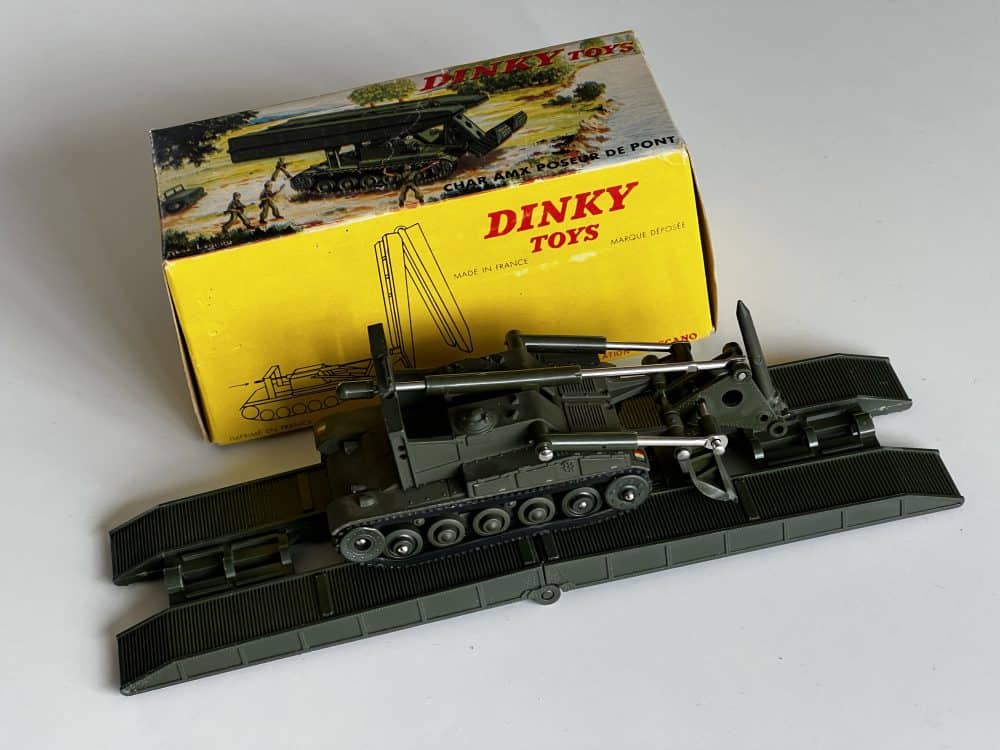 Detailed model of French Dinky 883 Char AMX bridge layer toy vehicle.