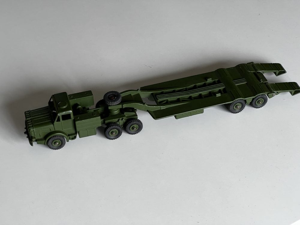 Dinky Toys 660 military tank transporter model, diecast green vehicle for collectors.