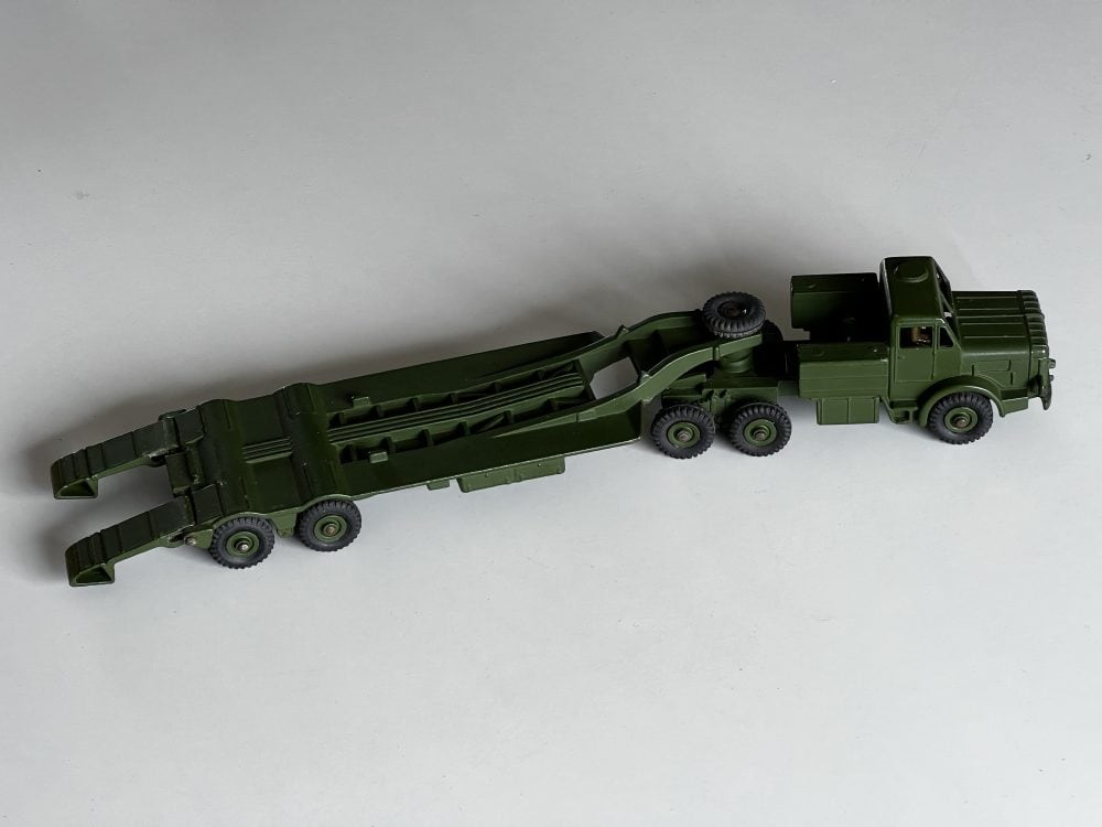 Dinky Toys 660 military tank transporter model in green, diecast collectible vehicle.