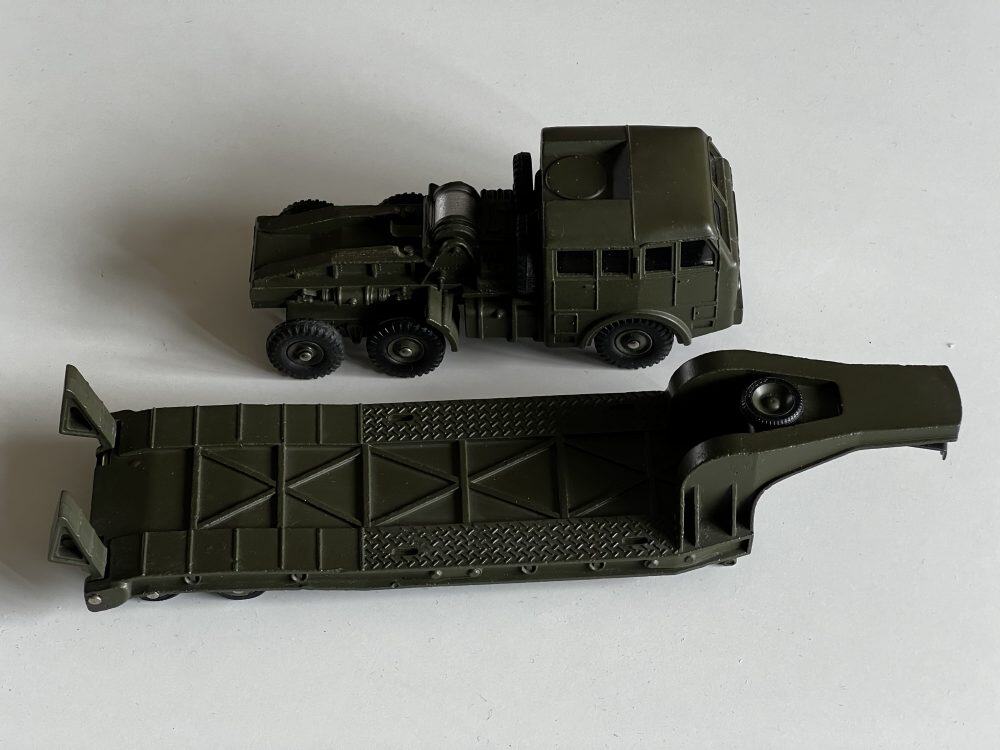 Dinky 890 Berliet tank transporter toy with detachable trailer and window glazing.