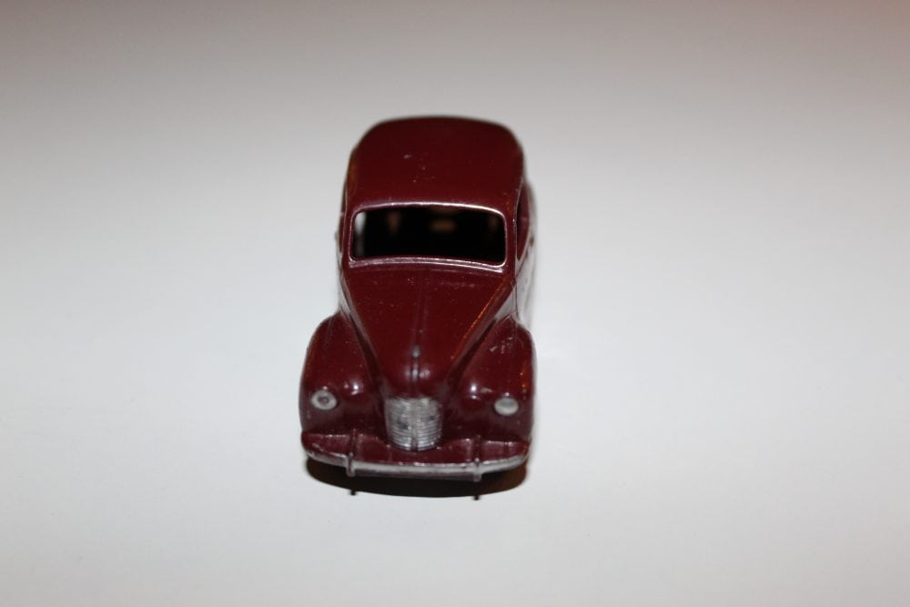 Vintage Dinky Austin Devon diecast model car, red collectible toy, from Dinky Toys 040d series.