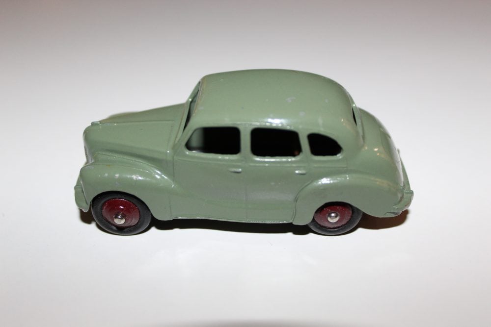 Vintage Dinky Toys Austin Devon diecast model car, green color, collectible toy.