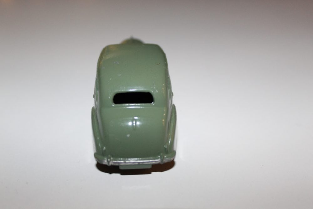 Vintage Dinky Toys Austin Devon diecast model car, green color, collectible toy.