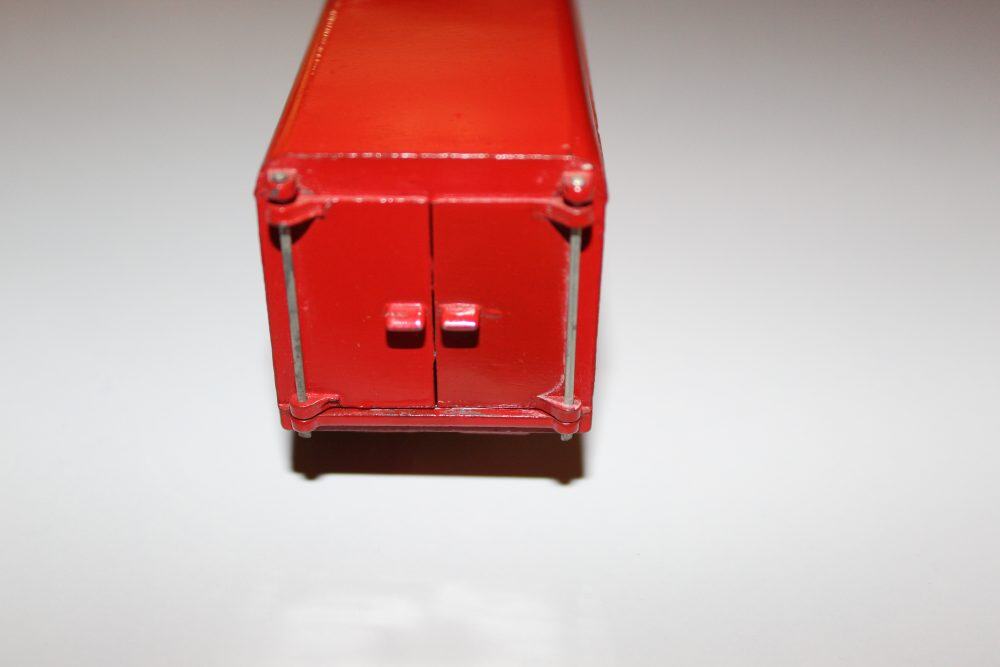 Vintage Dinky Toys 514 Guy Slumberland Van model, red diecast collectible.