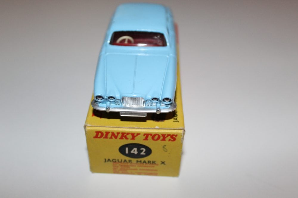 Dinky Toys 197 Morris Mini Traveller diecast model on original box, collectible vintage toy.