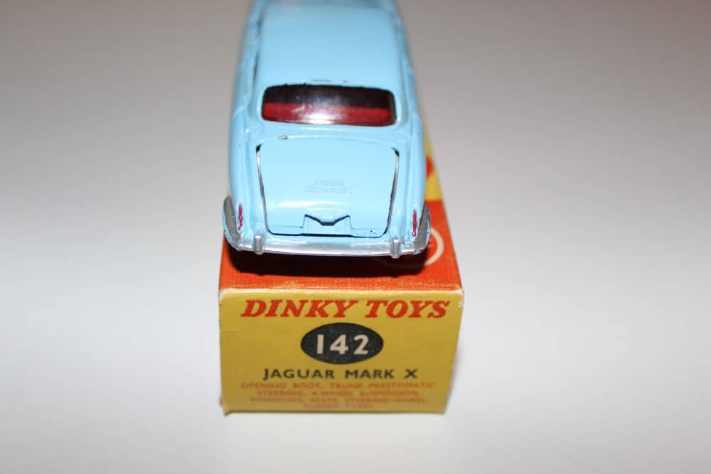 Dinky Toys 142 Jaguar Mark X diecast model on original box, collectible vintage toy.