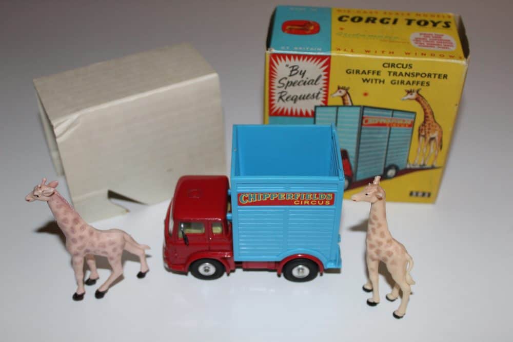 Vintage Corgi Toys 503 giraffe transporter with two giraffe figurines and packaging.