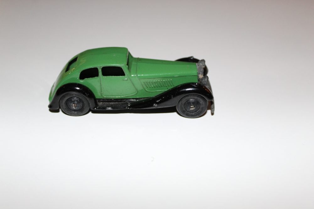 Dinky Toys 36d Rover vintage diecast toy car in green with black wheels.