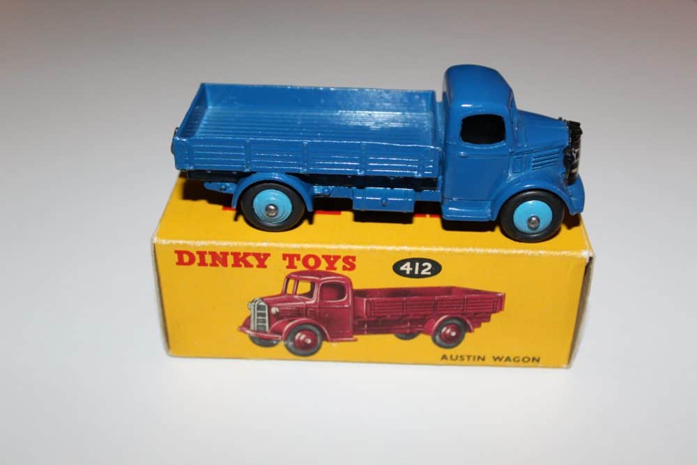 Vintage Dinky Toys 412 Austin Wagon model on yellow box.