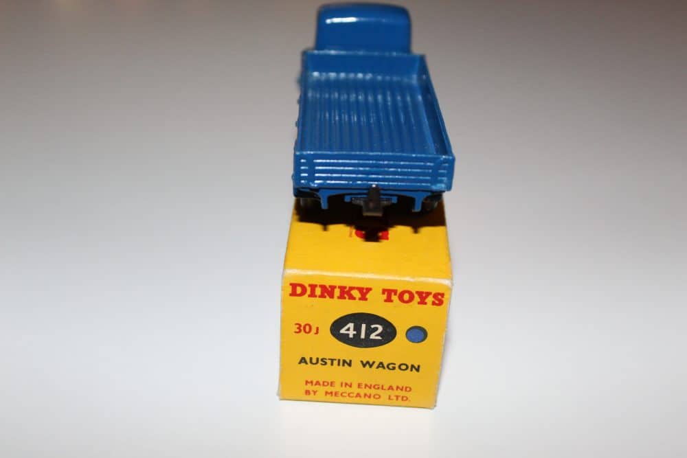 Dinky Toys 412 Austin Wagon diecast model in blue and yellow, vintage toy vehicle for collectors.