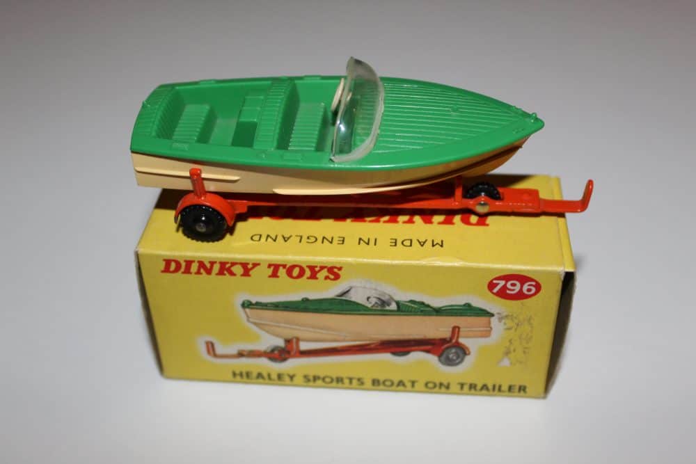 Vintage Dinky Toys Healey Sports Boat model on trailer, collectible diecast boat and trailer.